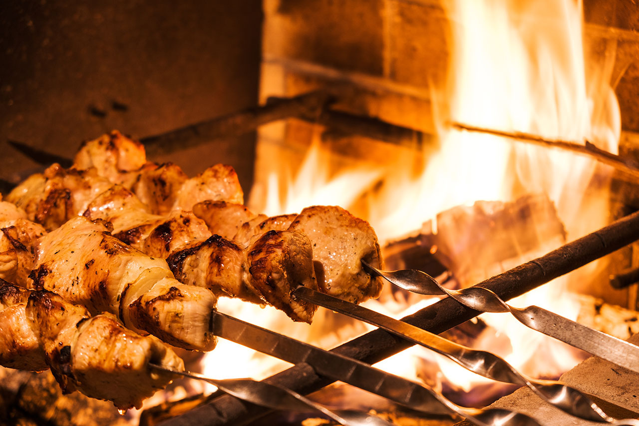 Chicken Skewers over grill.jpg